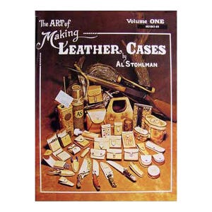 May include: A vintage book cover titled "The Art of Making Leather Cases" by Al Stohlman. The image showcases various leather cases, pouches, and tools, including knives and containers, in a warm, sepia-toned palette. Volume ONE is also visible.