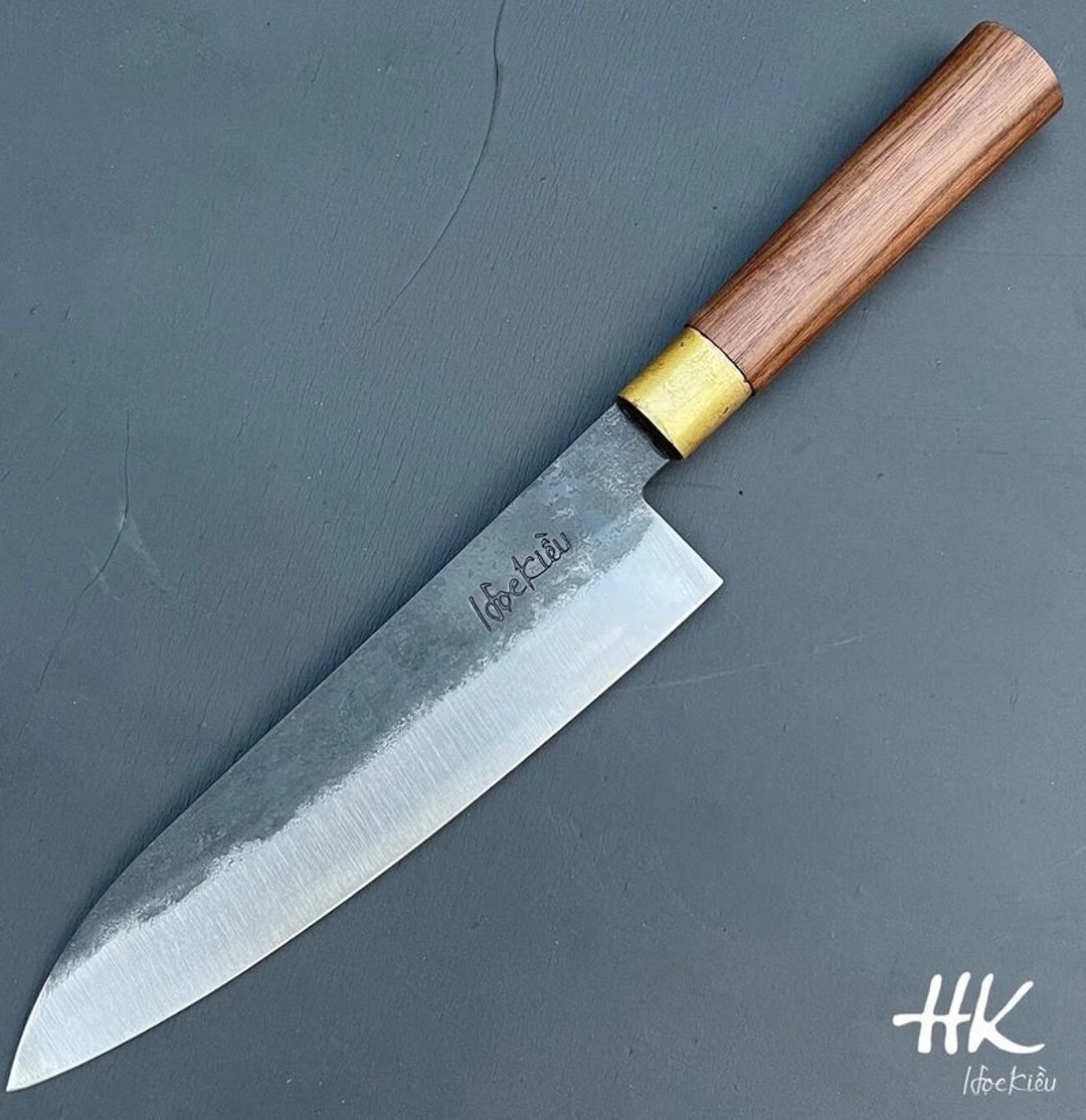 My first carbon steel knife finally has a good Patina. : r/chefknives