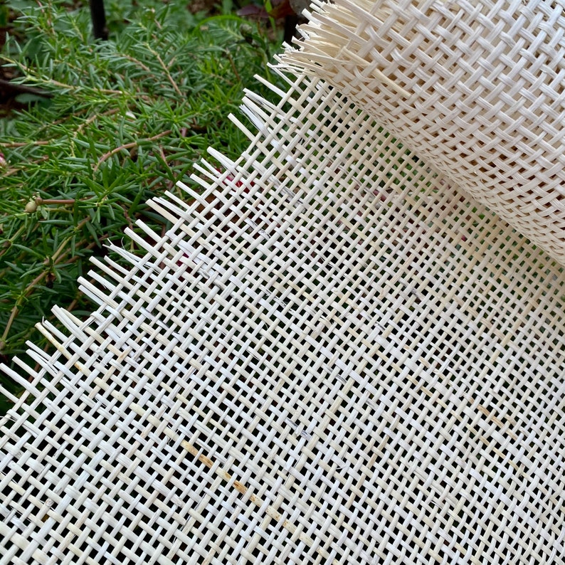 May include: White woven fiberglass mesh fabric, often used for chair seats and upholstery.