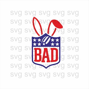 May include: A red and blue graphic with the word "BAD" in red letters. The design incorporates a shield shape with stars and a football, and red bunny ears.