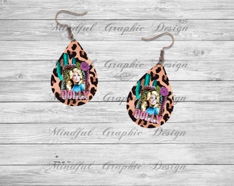 May include: A pair of teardrop-shaped earrings with a brown and black leopard print design. The earrings feature a picture of Dolly Parton with the word "DOLLY" printed below her image. The earrings have a silver hook.