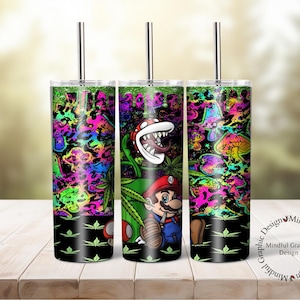 May include: Three stainless steel tumblers with lids and straws. Each tumbler features a different psychedelic design with a video game character, mushrooms, and plants. The tumblers are on a wooden surface.