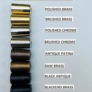 May include: Image showcasing eight different brass finish types. The finishes include polished brass, brushed brass, polished chrome, brushed chrome, antique patina, raw brass, black antique, and blackened brass. Each finish is displayed on a cylindrical object.
