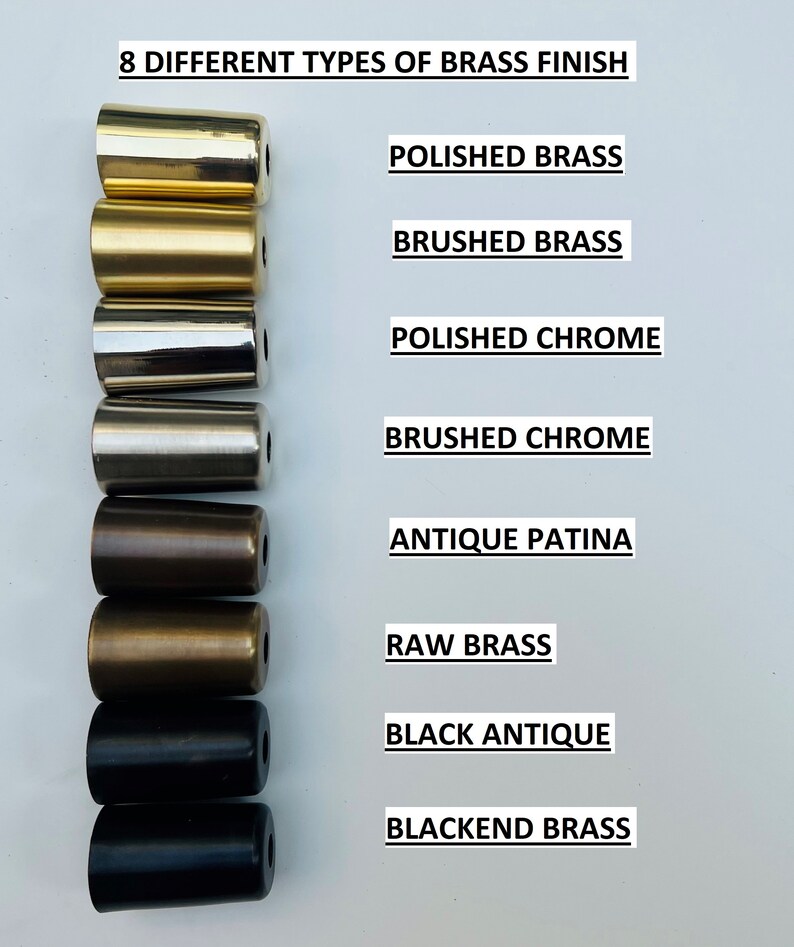 May include: Eight different types of brass finishes are shown on small cylindrical metal pieces. The finishes include polished brass, brushed brass, polished chrome, brushed chrome, antique patina, raw brass, black antique, and blackend brass.
