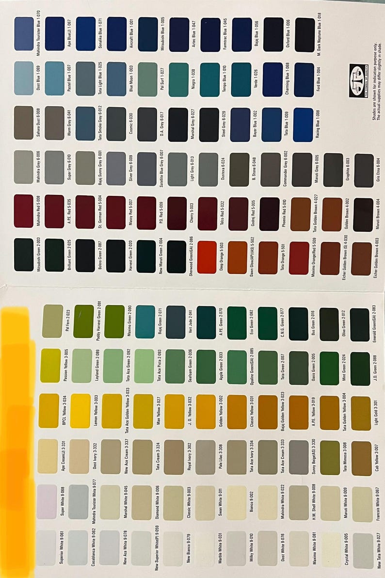 May include: A color chart displaying a variety of paint swatches, each labeled with a unique name and code. The palette includes shades of blue, green, red, yellow, gray, and white, suitable for automotive or industrial applications.