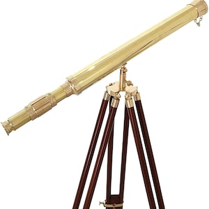 May include: A brass telescope with a wooden tripod. The telescope is extended and pointed to the right. The tripod has three legs and is made of dark wood.