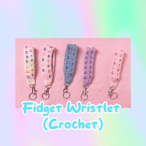 May include: Five crochet fidget wristlets in various colors, including white, pink, blue, and purple, each adorned with beads. The wristlets have silver-colored key rings attached. The text "Fidget Wristlet (Crochet)" is displayed in a colorful font.