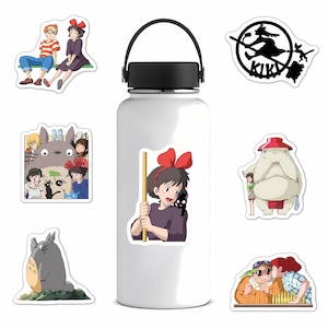 May include: A white water bottle with a black handle is adorned with several colorful anime-style stickers. The stickers feature characters from various animated films, including a witch on a broom, a large gray creature, and other figures.