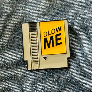 Retro Game Cartridge “Blow Me” Enamel Pin – Nostalgic Nerd Humor