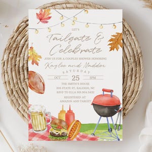May include: A watercolor invitation with the text "Tailgate & Celebrate" for a couples shower. The design includes a football, grill, food illustrations, and fall leaves. The invitation is on a woven placemat.