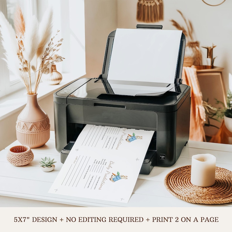 May include: Printable baby shower game cards featuring a Peter Rabbit illustration. The cards are designed to be printed two to a page, with the text "Baby Predictions" at the top of each card. The cards are 5x7 inches.