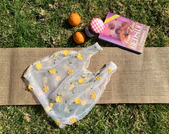 Bolsa de organza bordada con margaritas