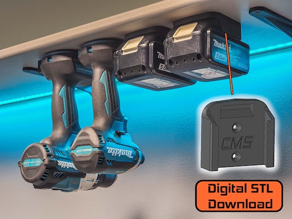 Custom 3D printed wall mounts holding cordless drills and batteries