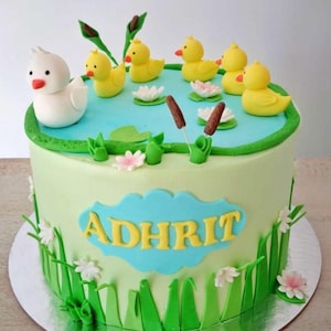 Duck themed fondant covered cake /1st birthday cake ,