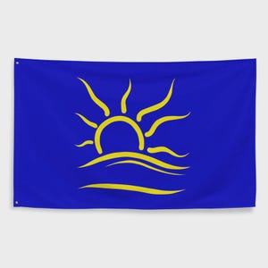 May include: A blue flag with a yellow stylized sun rising over waves.