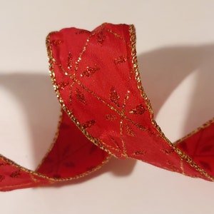 5 yds Wired Ribbon, Red Glitter Geometric pattern on a Solid Red background, with a Gold edge