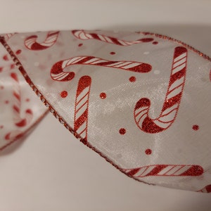 5 yds Wired Ribbon, Glitter Candy Cane pattern on a white background, with a red edge