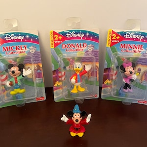Three Fisher Price Disney Collectibles