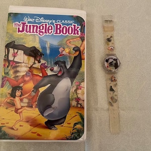 Walt Disney&#39;s The Jungle Book Black Diamond VHS and Childs Plastic Collectors Watch