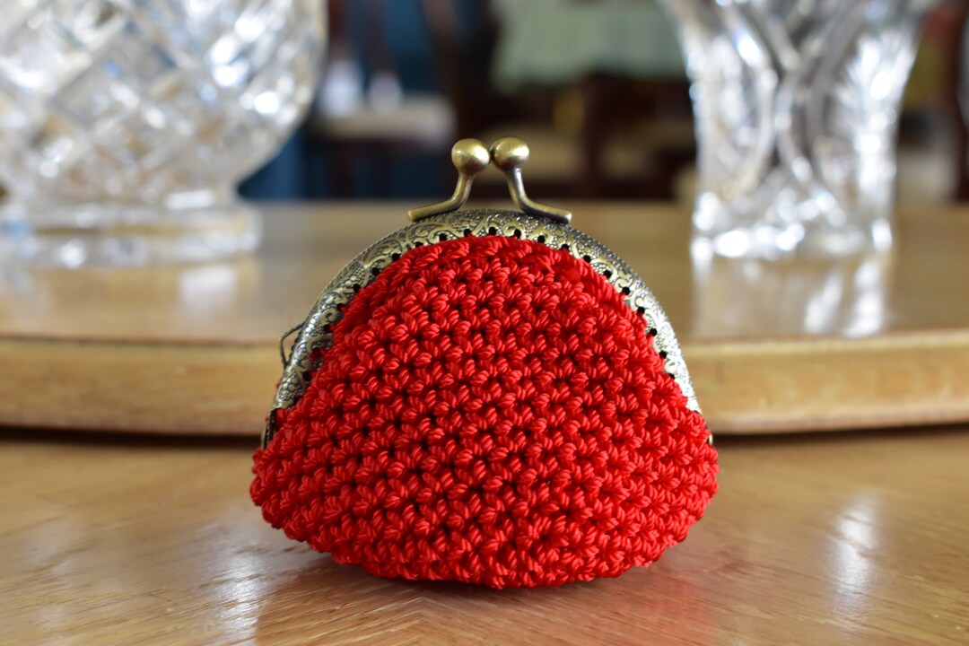 Broche monedero shop