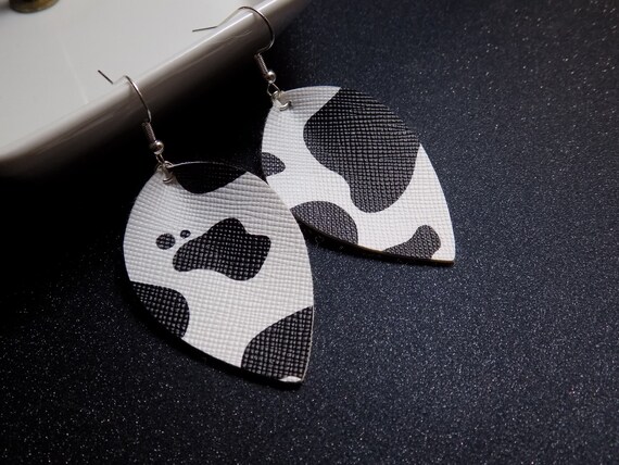 Cow print leather earrings deals