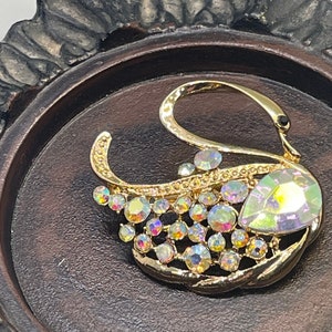 Luxe’s iridescent Crystal Swan Brooch Rhinestone gold tone rhinestone gift scarf accessory please see measurements In pictures