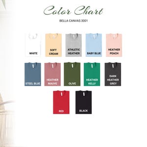May include: A color chart displays various t-shirt colors from Bella Canvas 3001. Colors include white, soft cream, athletic heather, baby blue, heather peach, steel blue, heather mauve, olive, heather kelly, dark heather grey, red, and black.