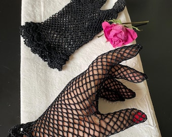 Pair of black crochet lace and ruffle gloves in perfect condition. Size M.