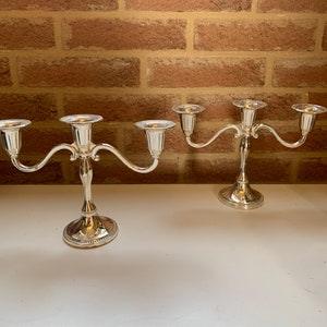 Pair of vintage silver-colored metal candlesticks. Made in England.