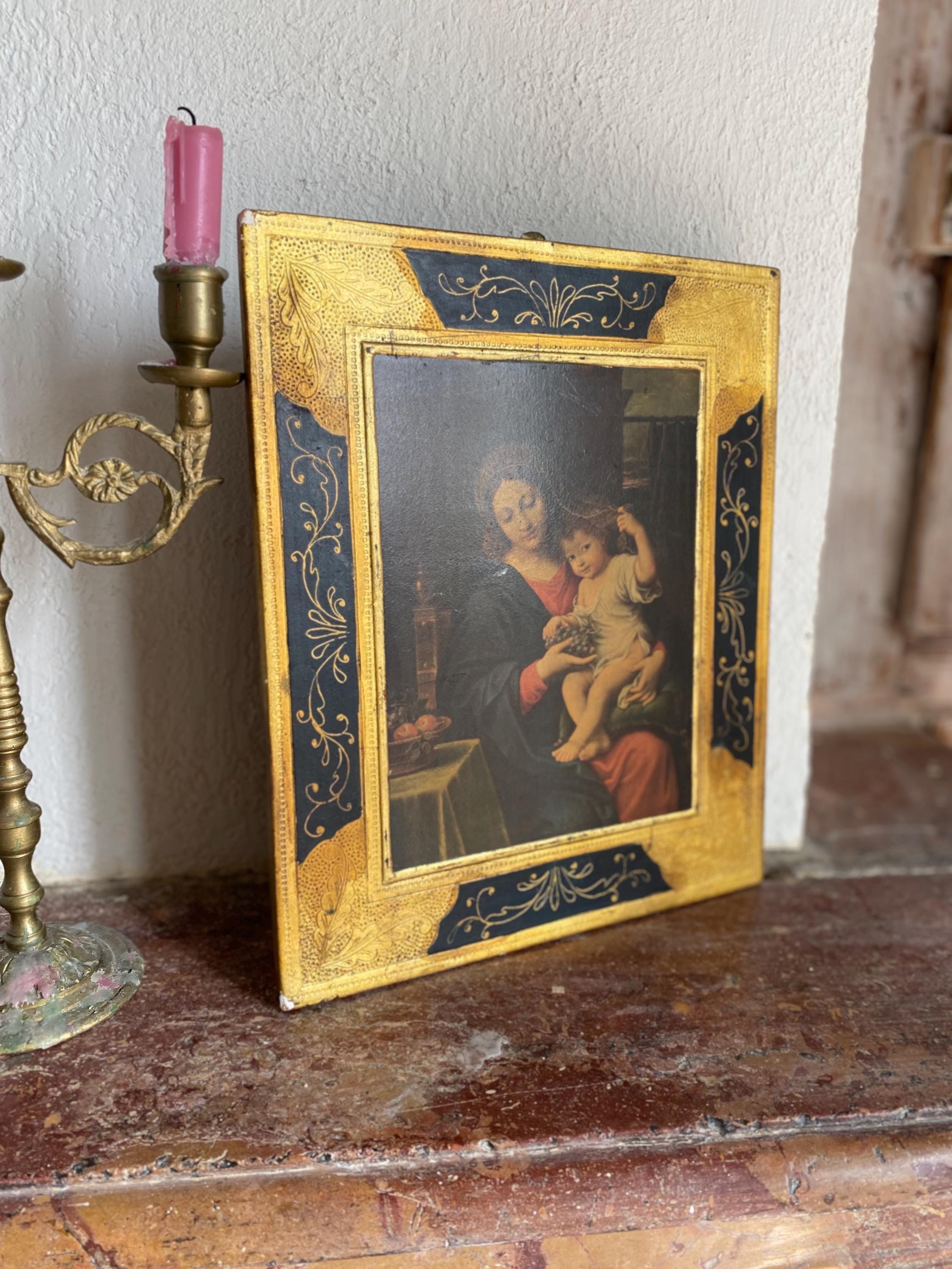 ルーヴル美術館所蔵のピエール・ミニャール作「葡萄の房を持つ聖母」の