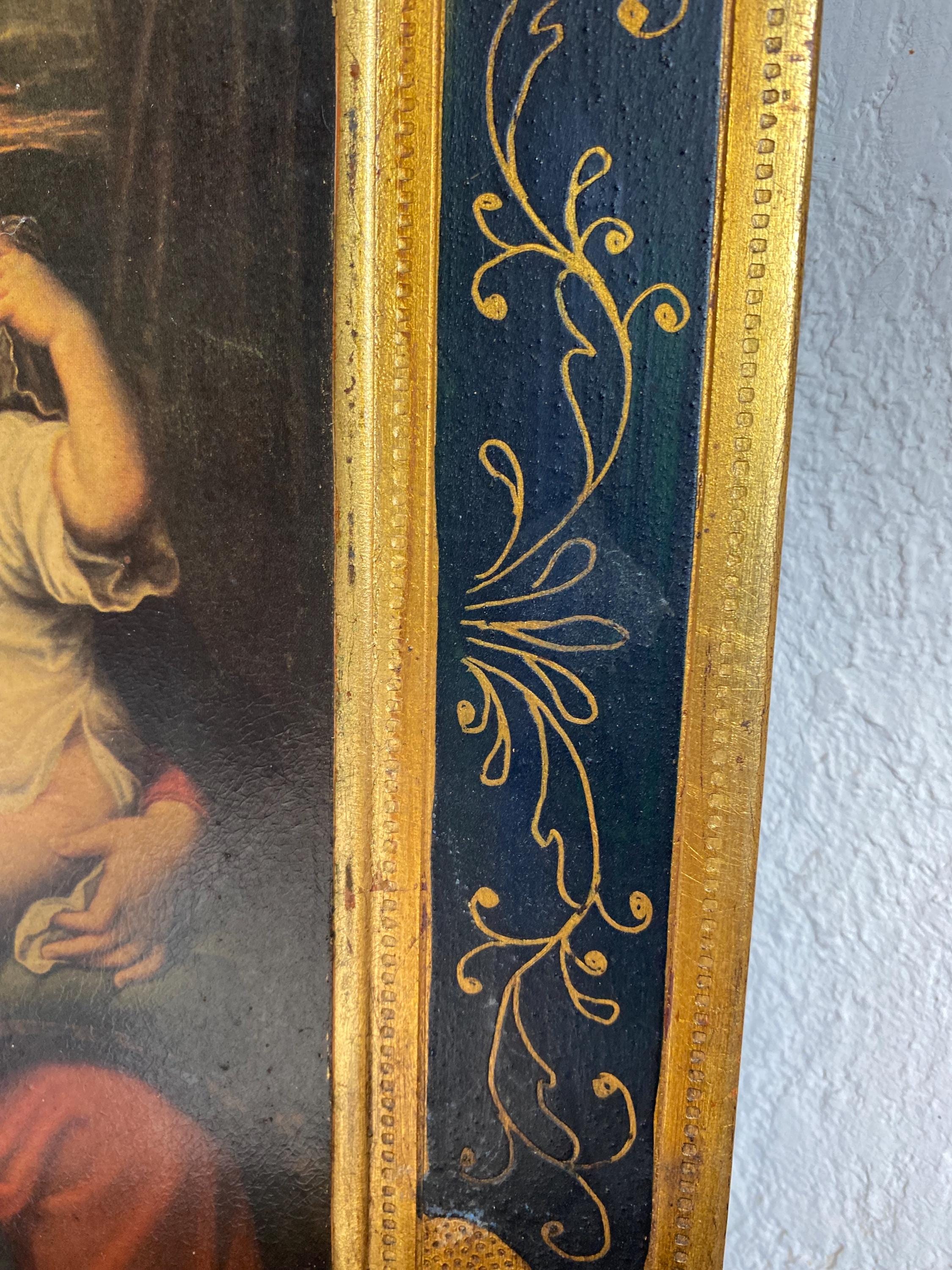 ルーヴル美術館所蔵のピエール・ミニャール作「葡萄の房を持つ聖母」の