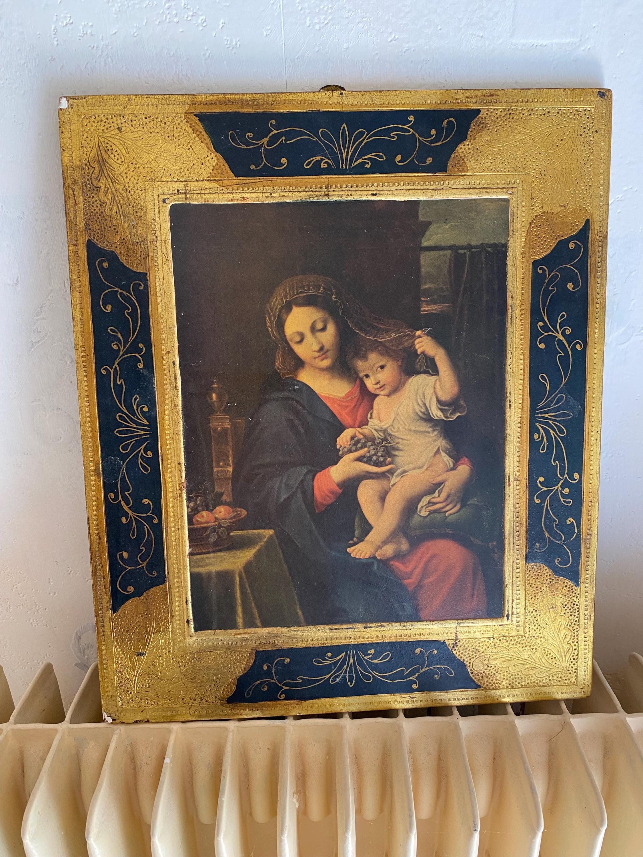 ルーヴル美術館所蔵のピエール・ミニャール作「葡萄の房を持つ聖母」の