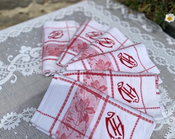 Set of 6 embroidered damask napkins. AV monogram. Red and white.