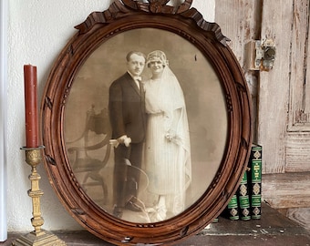Very large 1900 French photo medallion frame with Louis XVI style bow, oval, French wedding photo frame with bow.