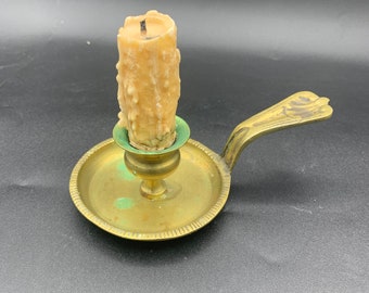 Antique brass candlestick.