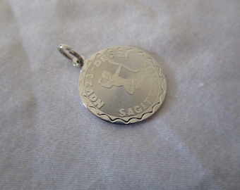 May include: Silver charm pendant with a Sagittarius zodiac symbol and the dates "Nov 22 - Dec 21".