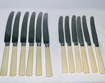Grosvenor - 12 place setting faux bone / zylonite handled entree & dinner knife