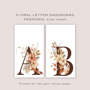 May include: Two printable floral letter dashboard inserts, featuring the letters A and B in brown with watercolour floral designs in shades of orange, pink, and cream. Printed on 180 gsm vellum paper.