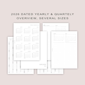 May include: A selection of white paper planner inserts featuring yearly and quarterly calendar layouts for 2026. The text "2026 DATED YEARLY & QUARTERLY OVERVIEW, SEVERAL SIZES" is at the top. Includes a yearly agenda and quarterly calendars.