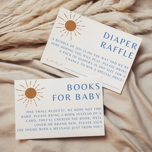 May include: Two cards with a sun graphic and blue text. The top card says "Diaper Raffle" and has instructions to bring a pack of diapers for a chance to win a special price. The bottom card says "Books for Baby" and asks guests to bring a book instead of a card.
