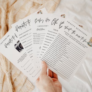 May include: A set of printable baby shower games with a white background and black text. The games include "How Old Were the Parents-to-Be", "Parents-to-Be Advice for the Predators", "Baby Shower Oh Baby About the Mom-to-Be", and "Twenty Questions About the Mom-to-Be".