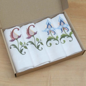 Linen napkins Roksolana. Set of white cloth napkins with color embroidery. Table linens, table decor. Size of each napkin: 40x40 cm.