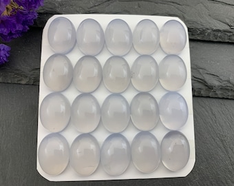 Cabujón ovalado de calcedonia azul de 12 x 16 mm *