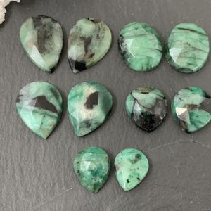 Faceted Emerald Pair 10-16mm long cabochons- e