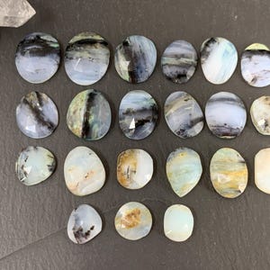 Faceted Peruvian Opal oval, pear 10-17mm long cabochon