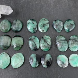 Faceted Emerald pair 14-18mm long cabochon- e