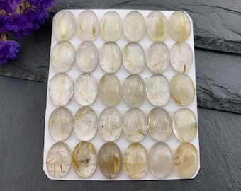 Gold Rutilated Quartz oval 10x14mm cabochon *