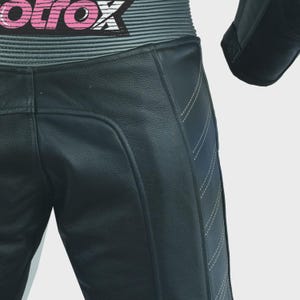 May include: Black leather motorcycle pants with white stitching and a gray and pink "MotoX" logo on the waistband.