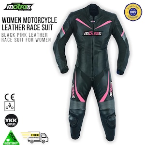 May include: Black and pink leather motorcycle race suit with a zipper closure and a 'Motrox' logo on the chest. The suit has pink accents and knee pads.