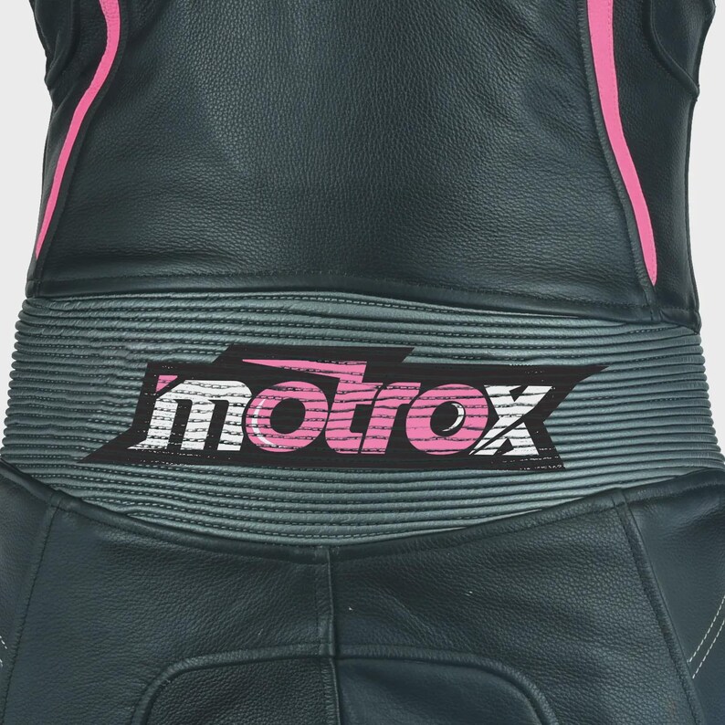 May include: Black leather motorcycle suit with pink accents and a gray and white "motrox" logo on the back.